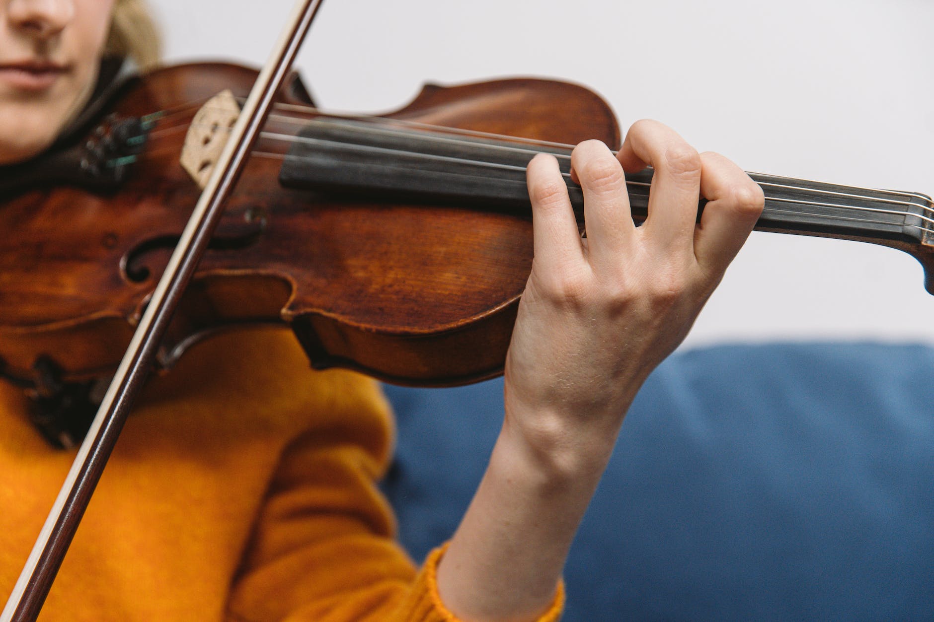 person playing a violin